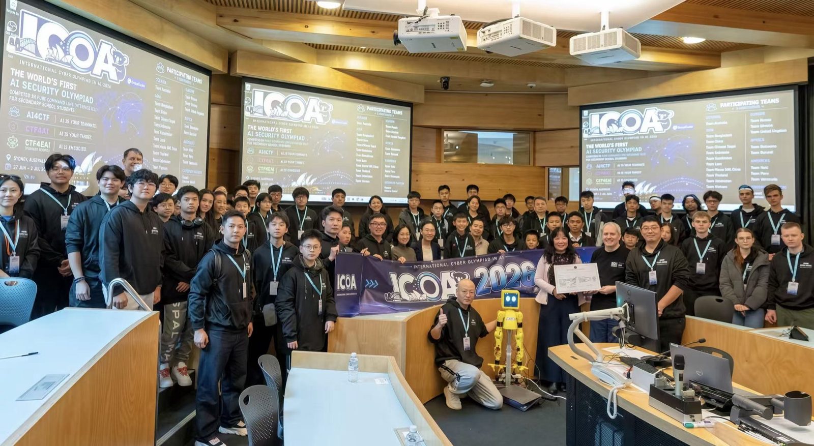 ICOA 2026 Medaillengewinner, Organisatoren und der Roboter der Embodied-AI Arena an der University of Technology Sydney